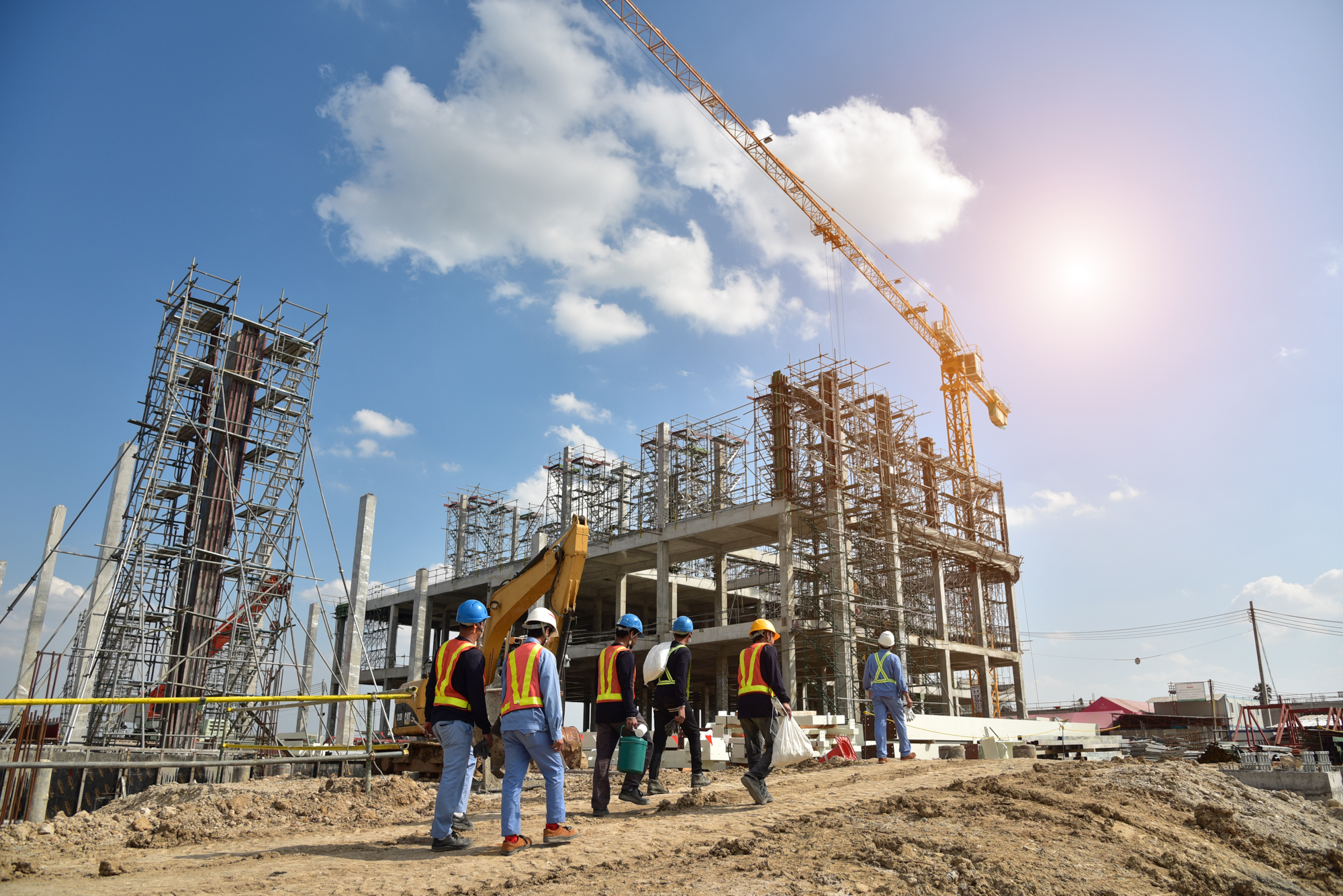 Construction Site with Cranes and construction worker